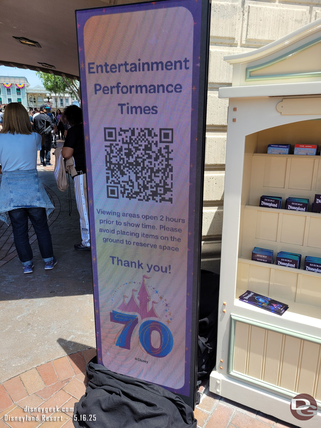 A new electronic sign with a QR code to scan for show times.  It loads the Disneyland App and takes you to the schedule for the day.