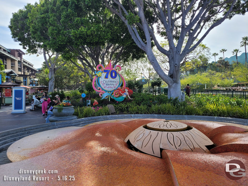 Downtown Disney has activation spots, banners, and window displays for Disneyland 70th.