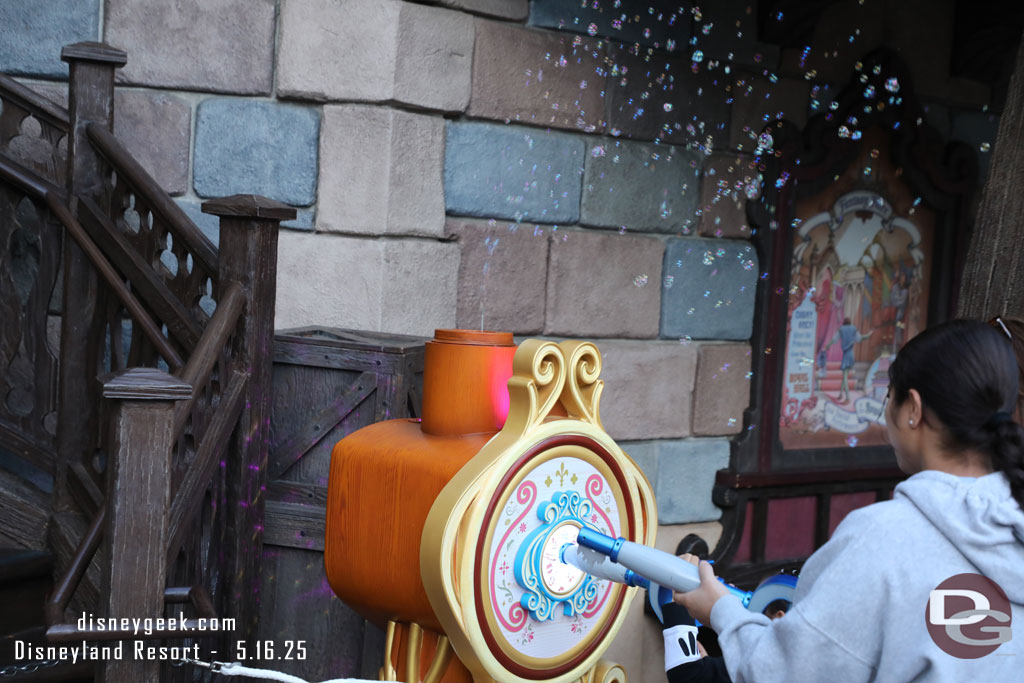 It lights up and blows bubbles in addition to some sound.