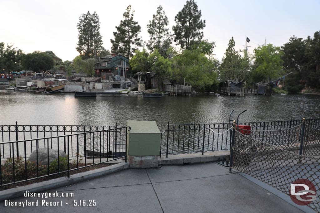 A lamp post along the Rivers of America is gone for renovation.