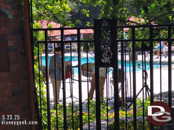 A steel drum group performing by the lounge/pool.