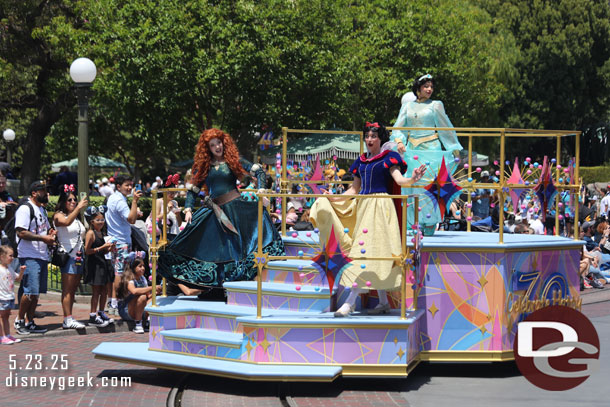 Merida, Snow White and Jasmine on the princess float.