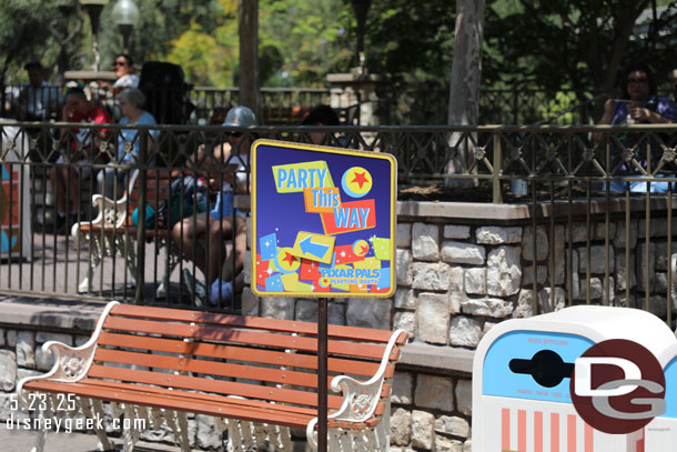 Signs directing guests to the Pixar Pals Playtime Party that returned today.