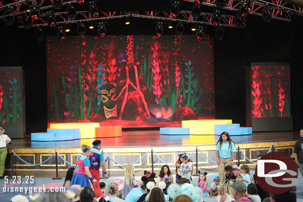 Cast Members playing a game with kids at the Pixar Pals Playtime Party