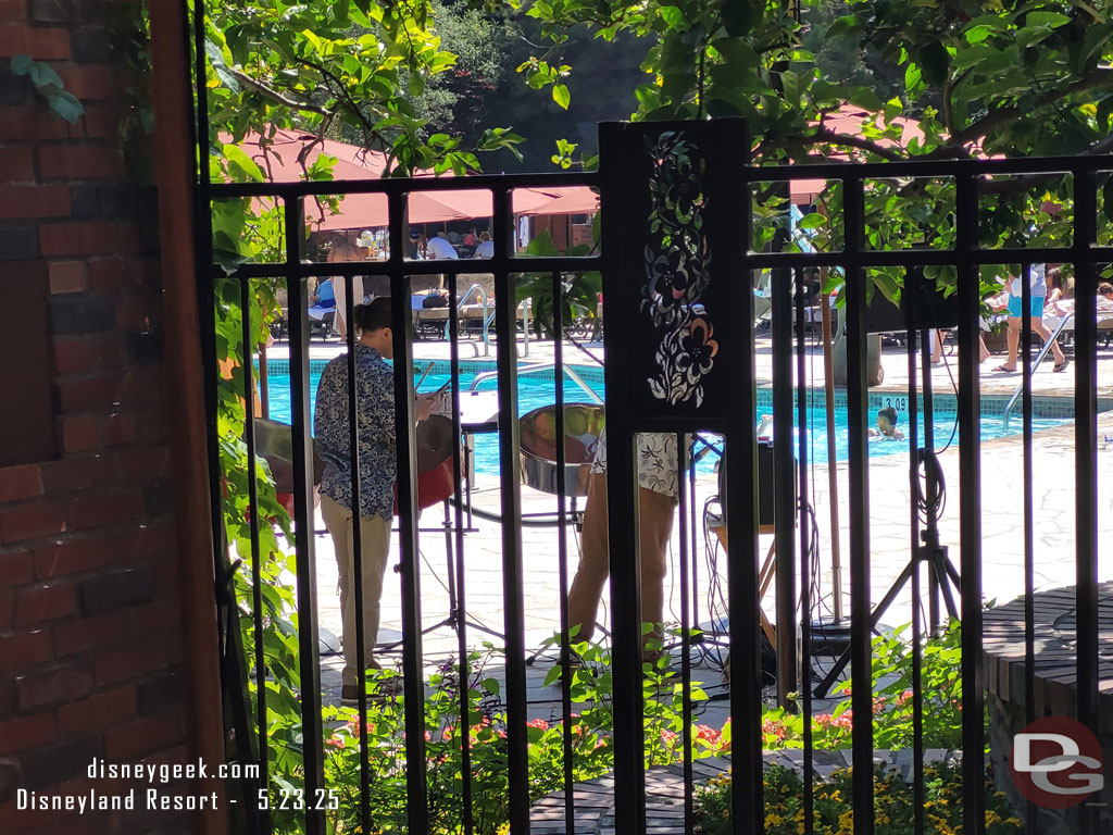 A steel drum group performing by the lounge/pool.