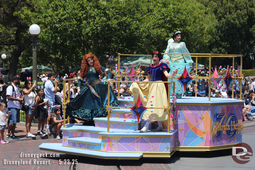 Merida, Snow White and Jasmine on the princess float.