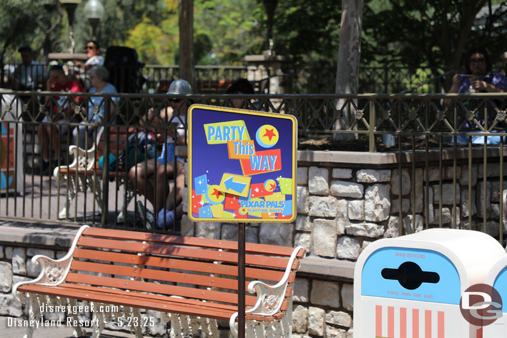 Signs directing guests to the Pixar Pals Playtime Party that returned today.