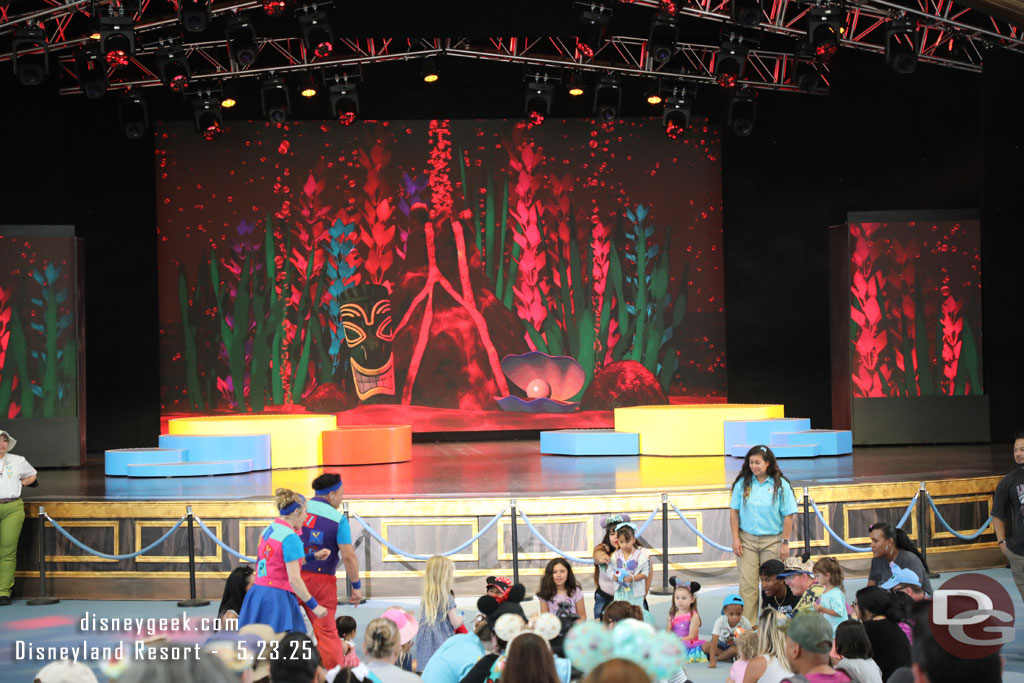 Cast Members playing a game with kids at the Pixar Pals Playtime Party