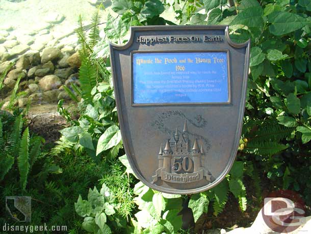 Each photo mosiac has a plaque that talks about the image depicted in it.  Here is the Winnie the Pooh one.