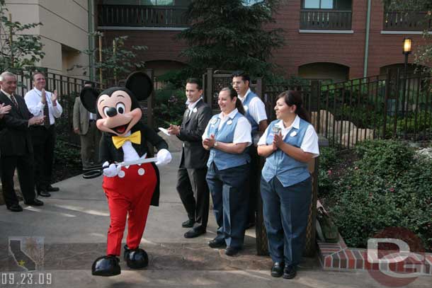 Mickey came out with the scissors for the ribbon cutting