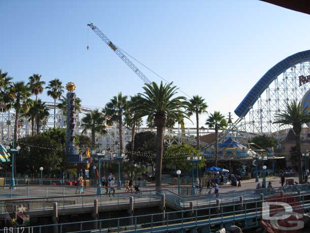 A large crane is visible for the work on Screamin