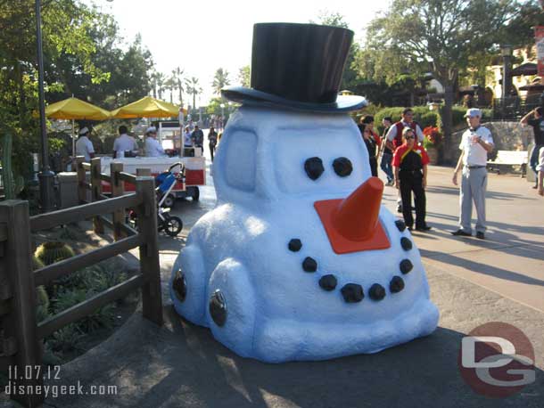 A snow car out front of Cars Land.