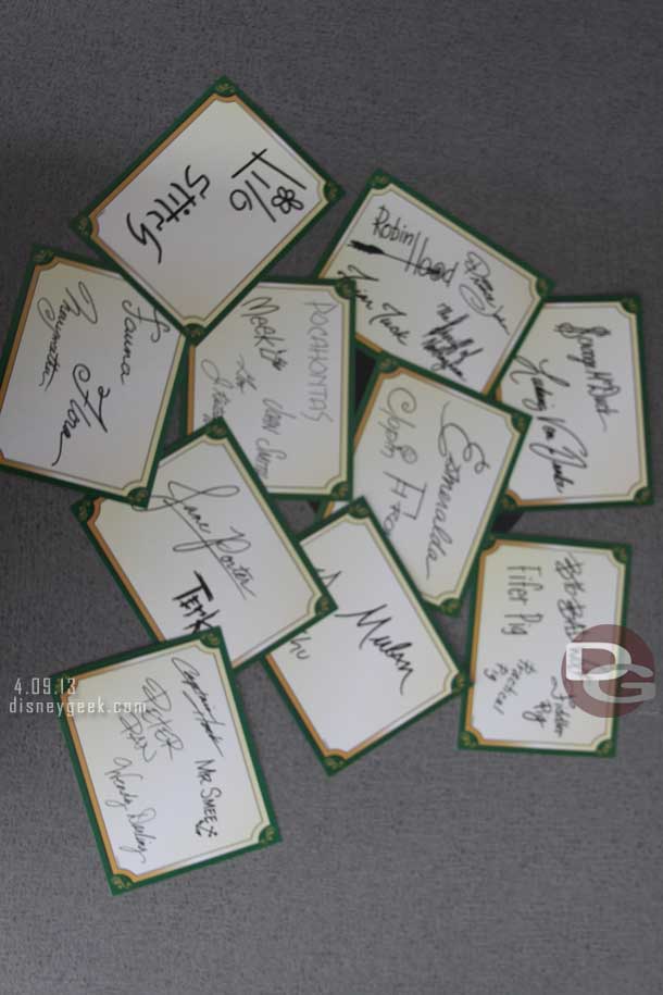 To keep the lines moving instead of the characters signing your autograph book you received a card with their signatures.