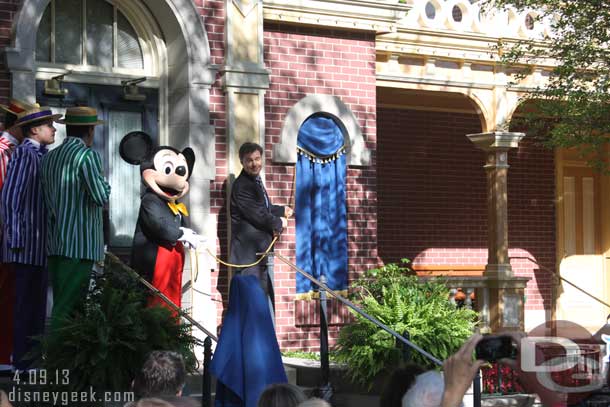 Michael does the honors with Mickey.