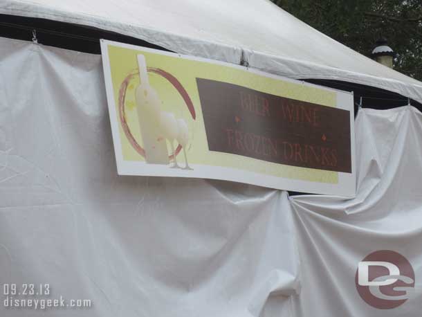 A tent set up with food options.