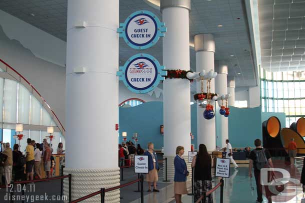 Inside the terminal there are some wreaths, ornaments and a tree.