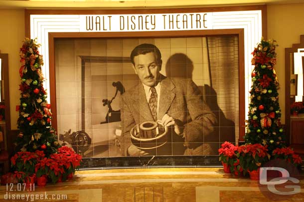 Near the Walt Disney Theater entrance on Deck 3.