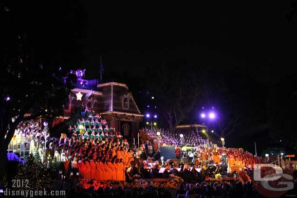 Once all are in place the orchestra and trumpets hit their first note and the choir comes to life as the lights turn on.