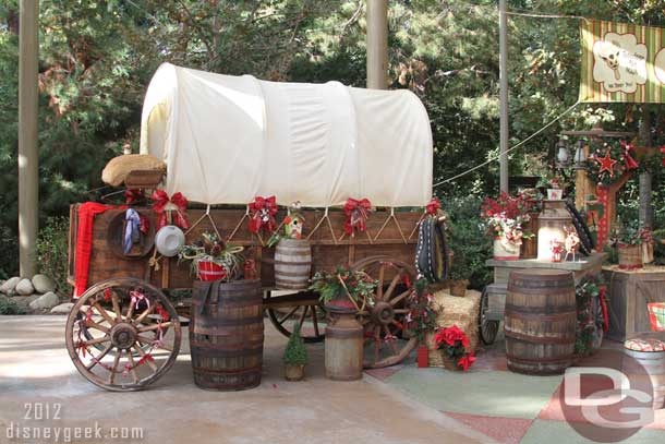 A covered wagon decorated for the season too.