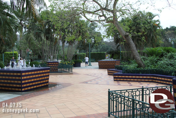 Several fountains and seating areas along the promenade