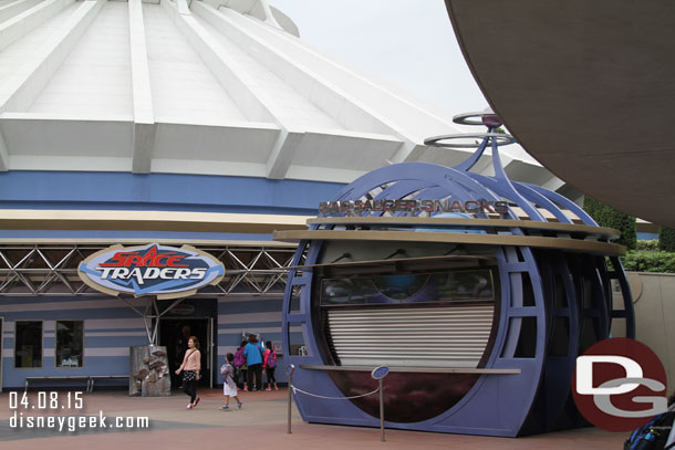 Space Traders (which I kept calling Star Traders) is at the exit to Space Mountain.  The snack shack sold hot dogs.