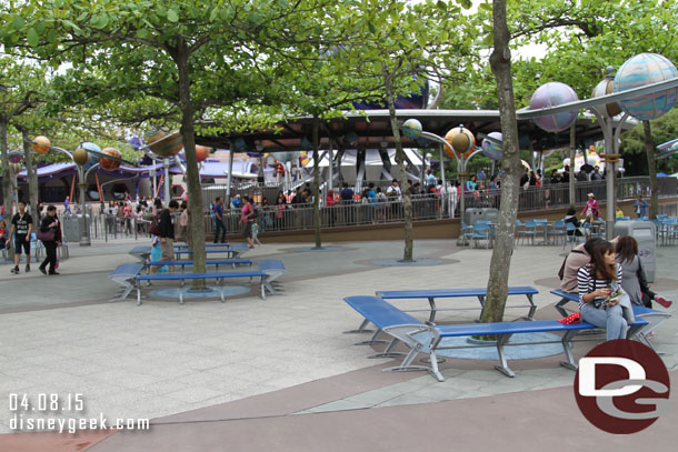 There is plenty of seating throughout the park.  The queue in the background is for the Orbitron