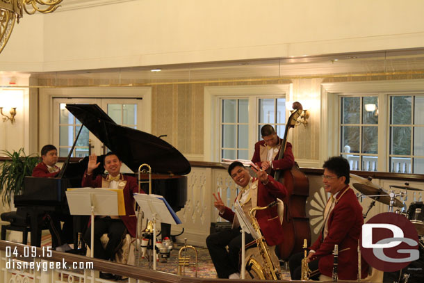 As I left the room I heard the echo of a band performing in the lobby so I walked down to see them.