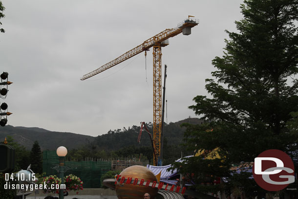 The crane for Ironman dominates the Tomorrowland skyline