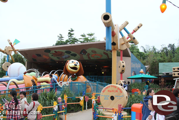 Across the walkway is the Slinky Dog Spin