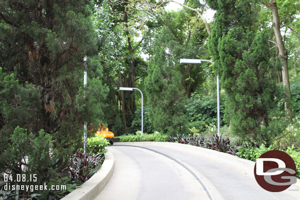 The road features a lot of plants and trees