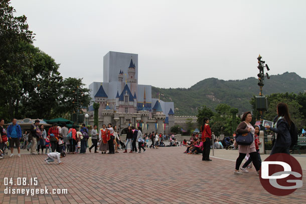 During my 2015 Trip to Hong Kong Disneyland the daytime parade was Flights of Fantasy.   This picture set will feature a look from the hub as well as Fantasyland.  I found a spot on the curb in the hub for my first viewing.
