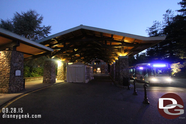 Outside.  To the left are the front doors.  Behind me bell services.  In the tent in front was an x-ray machine.. guessing for the airport buses.  The bus on the right is a shuttle to the train station.
