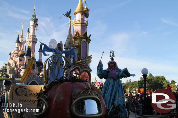 The parade opens with the Fairy Godmother and Blue Fairy.