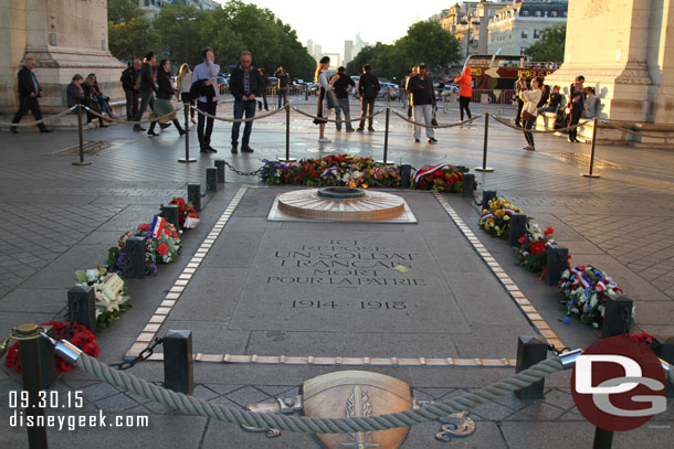 The tomb of the unknowns lies at the base of the arc