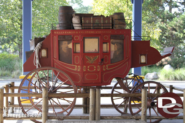 A stagecoach in front of the main entrance.