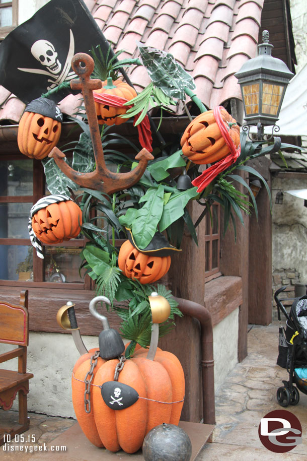 A daytime picture of the pirate pumpkins near the exit to Pirates of the Carri bean.