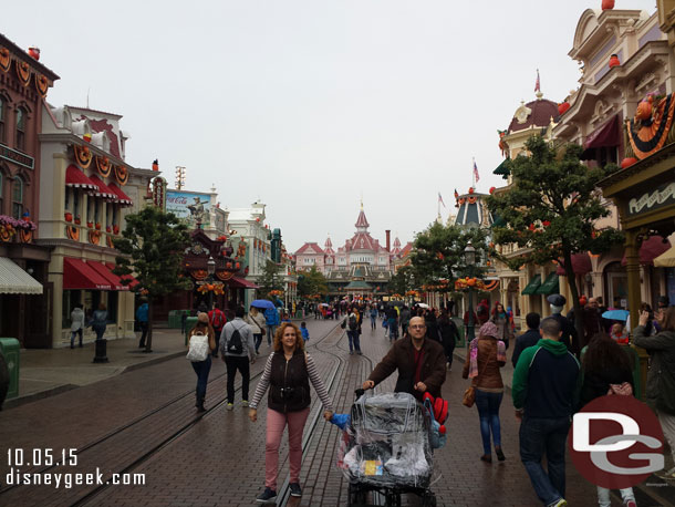 Walking down Main Street USA as the rain started to fall.