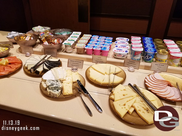 An assortment of cheeses and other spreads