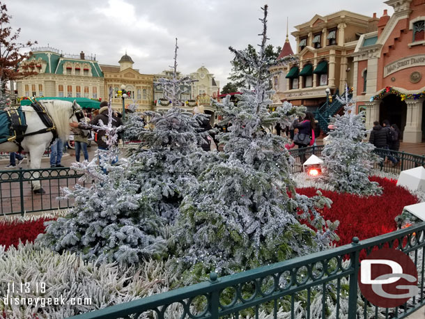 Town Square features snow covered trees for Christmas