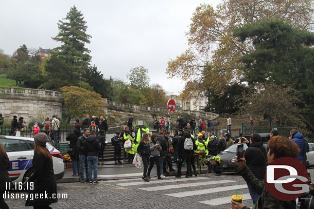 More activity at the base now.  Seems like a protest is going to be getting underway.  A number of yellow vests and police in the area.