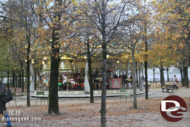 A carousel in the park.