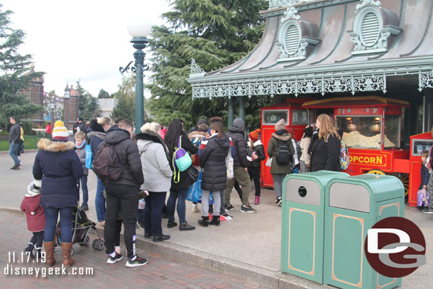 The first line for popcorn I remember seeing. It was a nice afternoon and the park had a lot of guests in it.