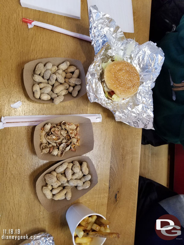 The other day I received comments that I did not show the food.. so here is  look at our table.  Shelled peanuts are available (free), also in the picture is a burger and some fries.