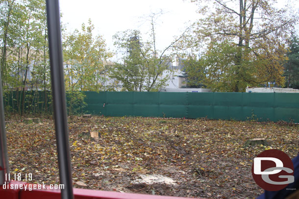 Several trees and more fences on the other side of the tram too, this is looking toward the park.