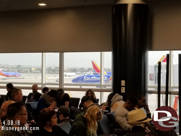 Went down to the gate just before noon and there were a lot of people but no plane outside.  The plane had arrived earlier in the morning and had gone to the a hanger.  It was late coming out.