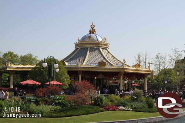 The Fantasia Carousel is the first attraction you come to.  It is to the right as you enter the Gardens of Imagination and head toward the castle.