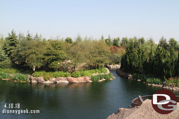 Panning to the right beyond the woods is the rest of Fantasyland.