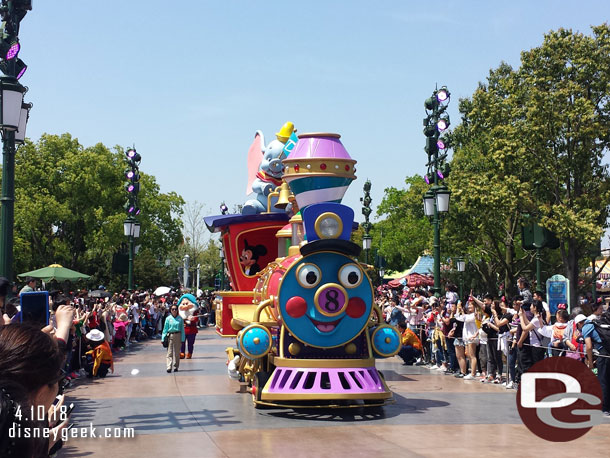 Casey Jr. Leads off the parade with Mickey and Donald in the cab.