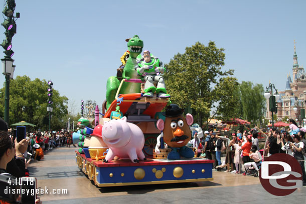Buzz on the front of the float with many other familiar characters.
