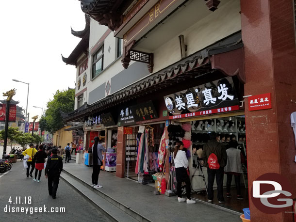 The street had several stores/kiosks.